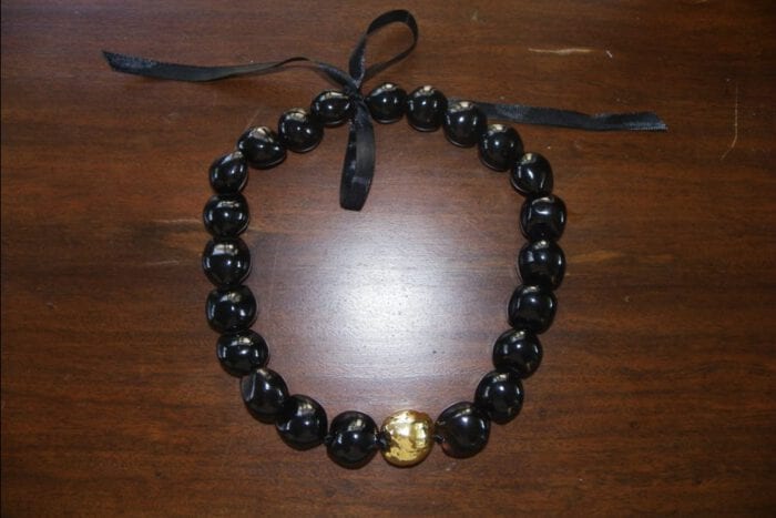 21 inch Black Polished Kukui Nut Lei with 24K Gold Plated Tiger Kukui Nut Middle