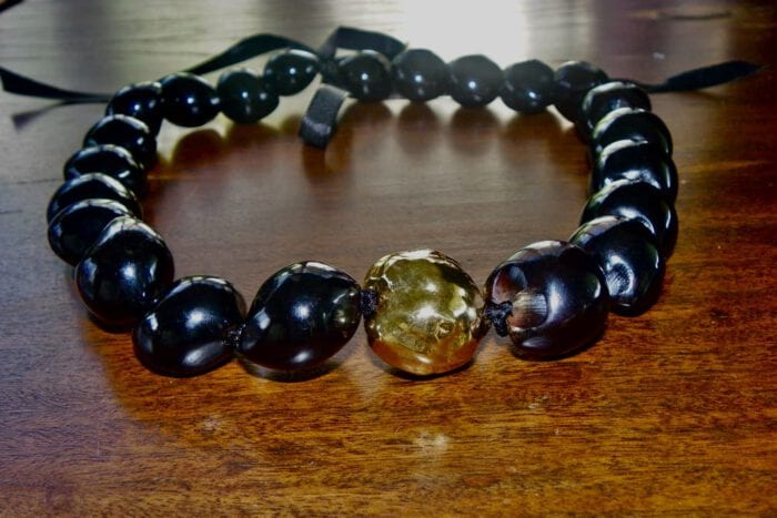 21 inch Black Polished Kukui Nut Lei with 24K Gold Plated Tiger Kukui Nut Middle