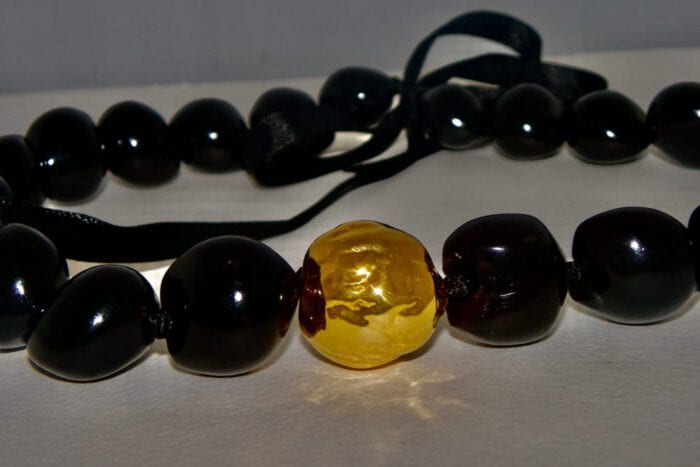 21 inch Black Polished Kukui Nut Lei with 24K Gold Plated Tiger Kukui Nut Middle