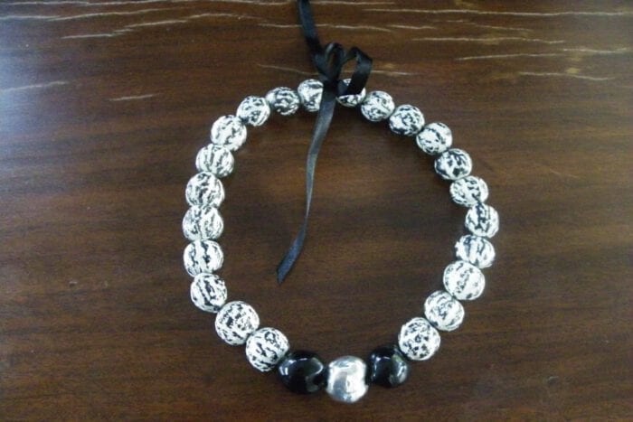 23 inch Black and White Tiger Kukui Nut Lei w/Pure Silver Plated Center Kukui