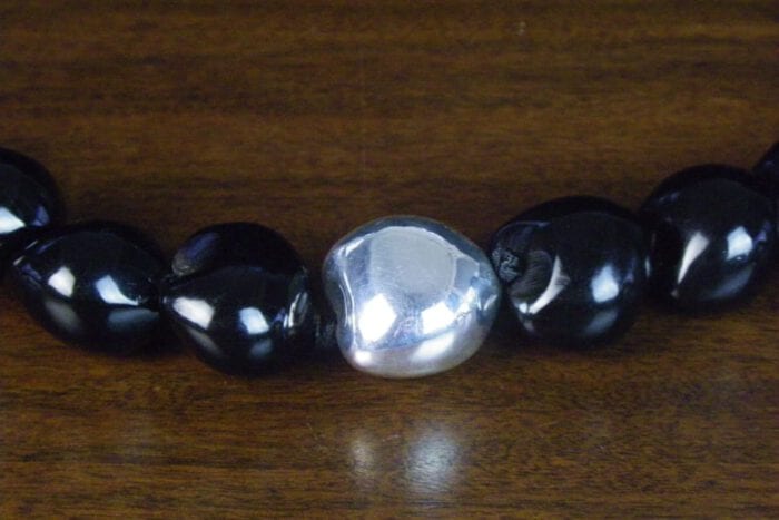 25 inch Black Kukui Nut Lei with 99% Pure Silver Plated Center Kukui