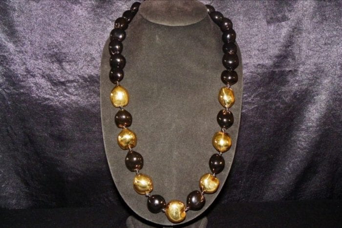 33 inches long Black Polished Kukui Nut Lei with Seven 24K Gold Plated Kukui Nuts