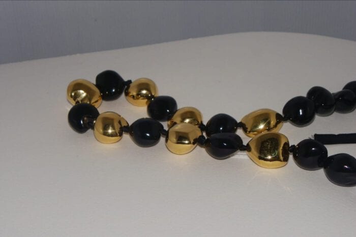 33 inches long Black Polished Kukui Nut Lei with Seven 24K Gold Plated Kukui Nuts