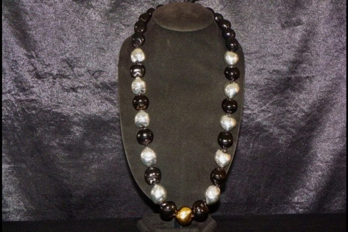 35 inches long Polished Black Kui Nut Lei with 24K Gold Center Kukui surrounded with Ten 99% Pure Fine Silver Kukui Nuts