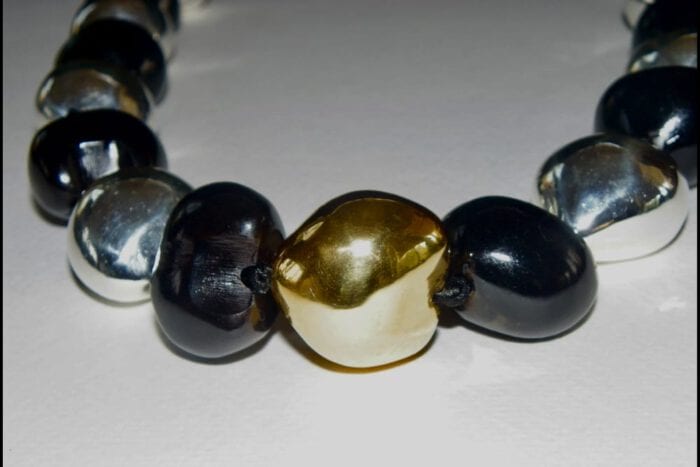 35 inches long Polished Black Kui Nut Lei with 24K Gold Center Kukui surrounded with Ten 99% Pure Fine Silver Kukui Nuts