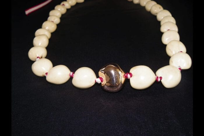 36 inches Long Natural Kukui Nut Lei with a single 18K Rose Gold Center Kukui Nut