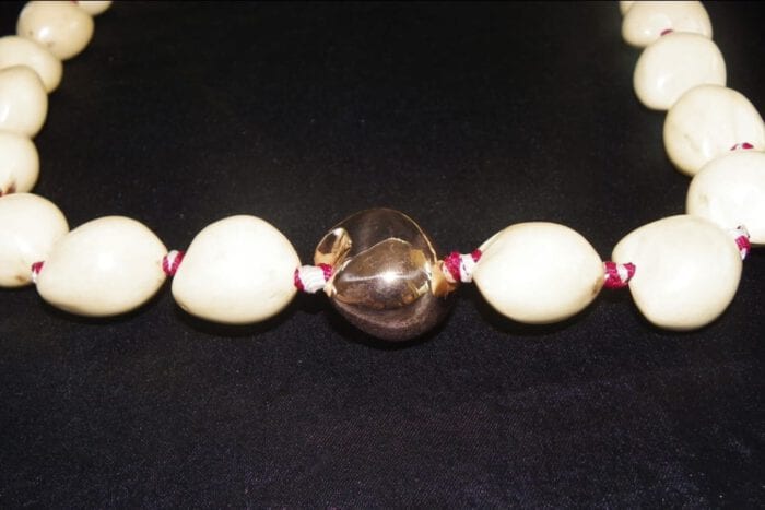 36 inches Long Natural Kukui Nut Lei with a single 18K Rose Gold Center Kukui Nut