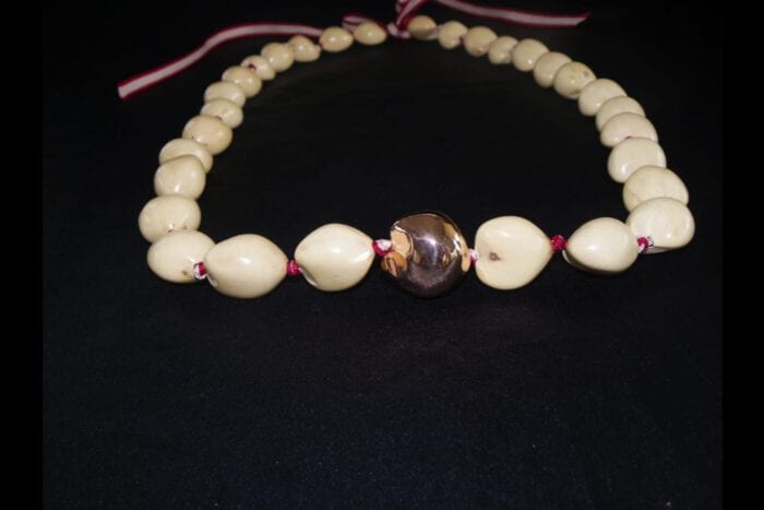 36 inches Long Natural Kukui Nut Lei with a single 18K Rose Gold Center Kukui Nut