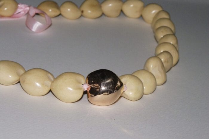 31 inch Natural Kukui Nut Lei with 18K Rose Gold Plated Center Kukui Nut